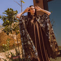 Elegant Drape: Embroidered Cape Abaya with High-Neck Silk Dress