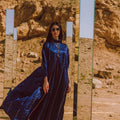 Silken Allure: Embroidered Abaya with Wood & Leather Accents