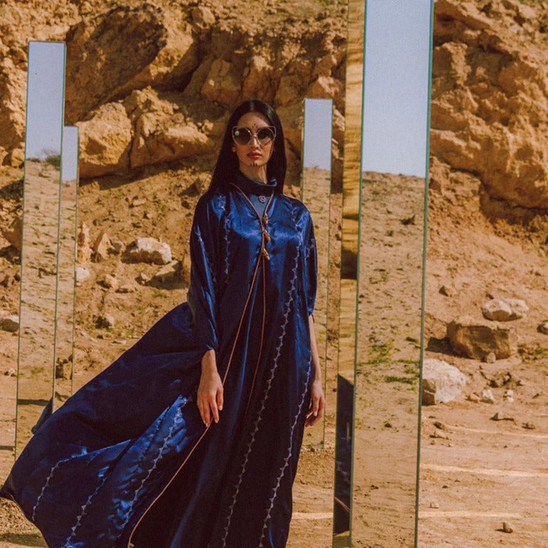 Silken Allure: Embroidered Abaya with Wood & Leather Accents